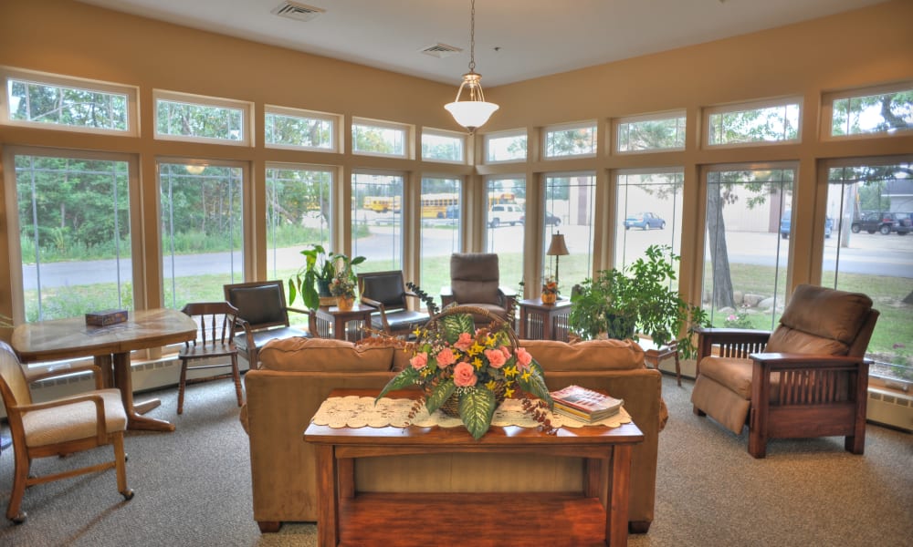 Sunroom with many windows and natural light at The Residences on Forest Lane in Montello, Wisconsin