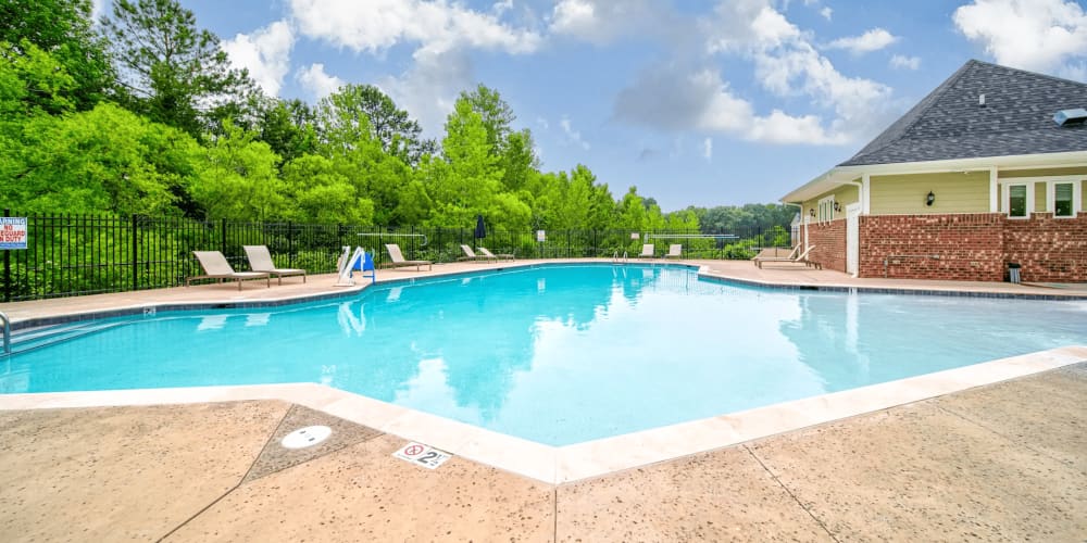 Clubhouse with pool at Seasons at Poplar Tent in Concord, North Carolina