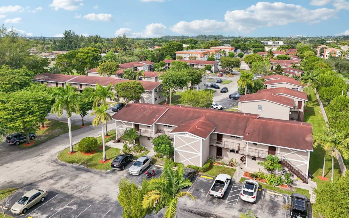 Exterior view of apartments at El Jardin Apartments in Hollywood, Florida