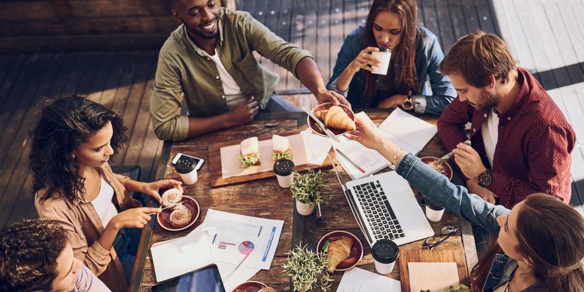 Employee on his laptop at Multifamily Management Inc in Mobile, Alabama
