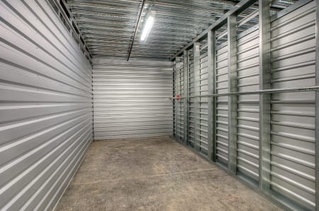 Interior view of large storage unit at StorQuest Self Storage