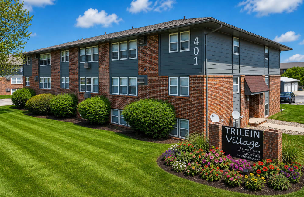 Brick apartment building exterior at Trilein Village in Ankeny, Iowa