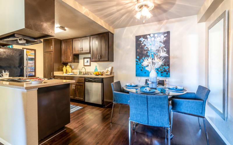 Espresso cabinets in the kitchen overlooking the dining room at Terra Nova Villas in Chula Vista, California