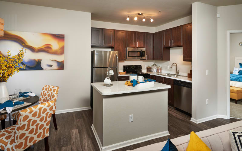 Renovated kitchen with stainless-steel appliances at Bear Valley Park in Denver, Colorado