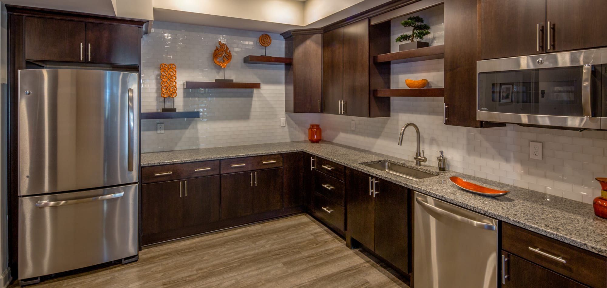 Kitchen with stainless steel appliances at CovePointe at The Landings, Norfolk, Virginia