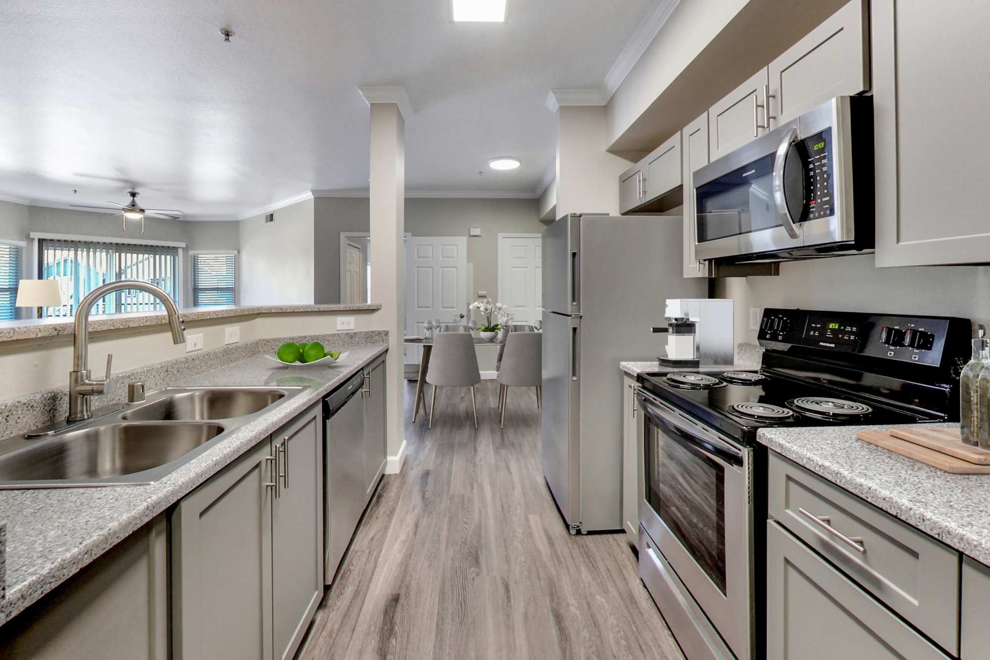 Kitchen with modern appliances at Avion Apartments in Rancho Cordova, California