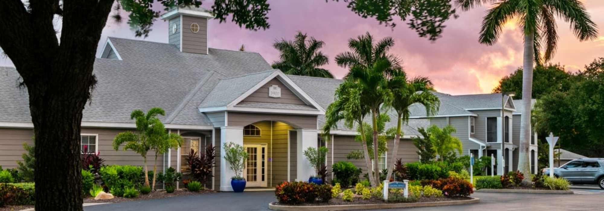 Exterior view of the apartment building at Woodmere Apartments of Venice in Venice, Florida