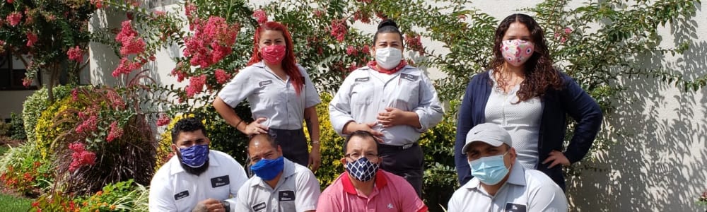 Staff wearing masks at Edgewood Management in Gaithersburg, Maryland