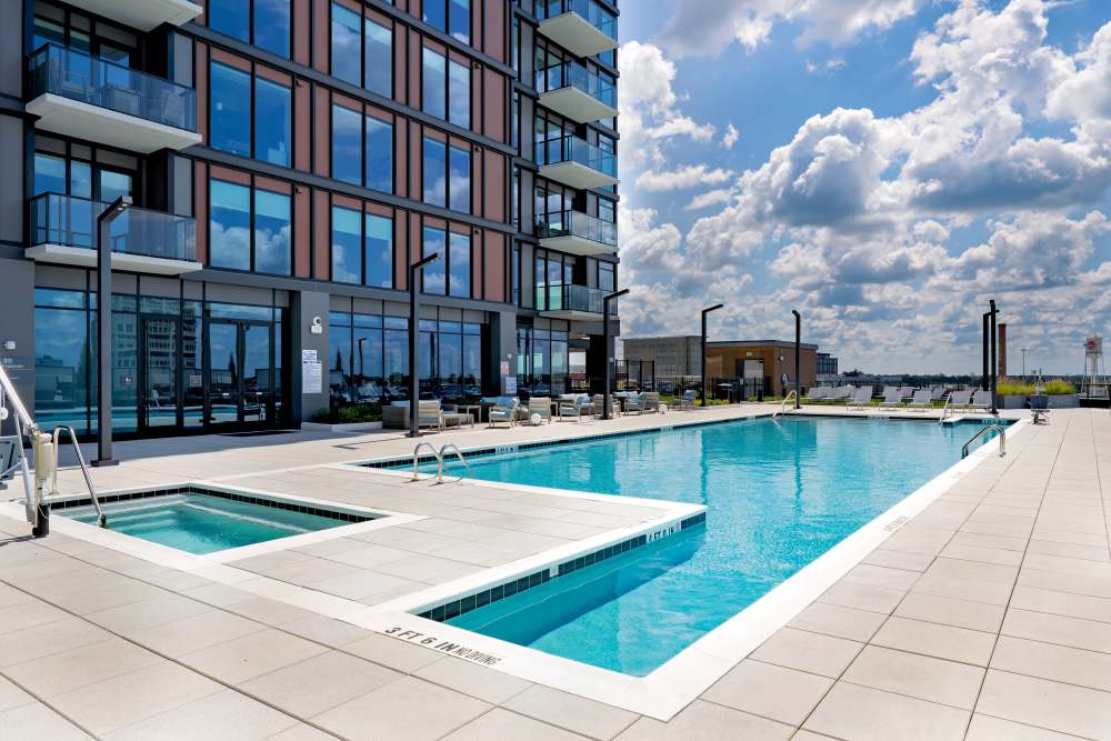 Resort-style swimming pool at The Novus Apartments in Durham, North Carolina