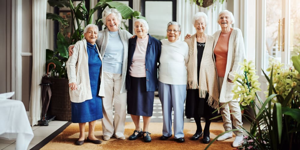 Residents hugging at The Springs Living in McMinnville, Oregon