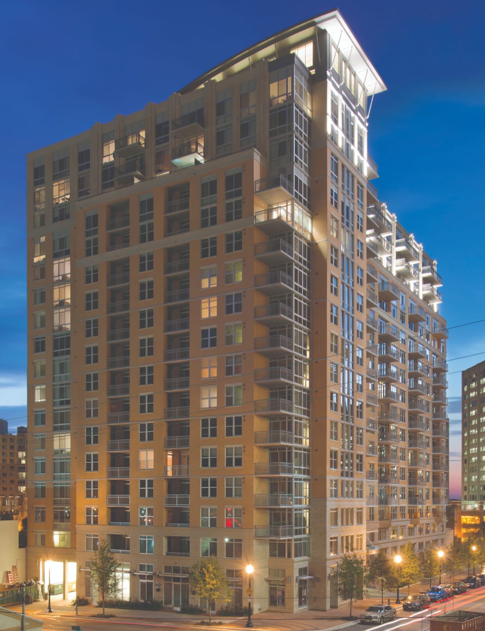 Street view of the apartment at dusk at Solaire 1150 Ripley in Silver Spring, Maryland