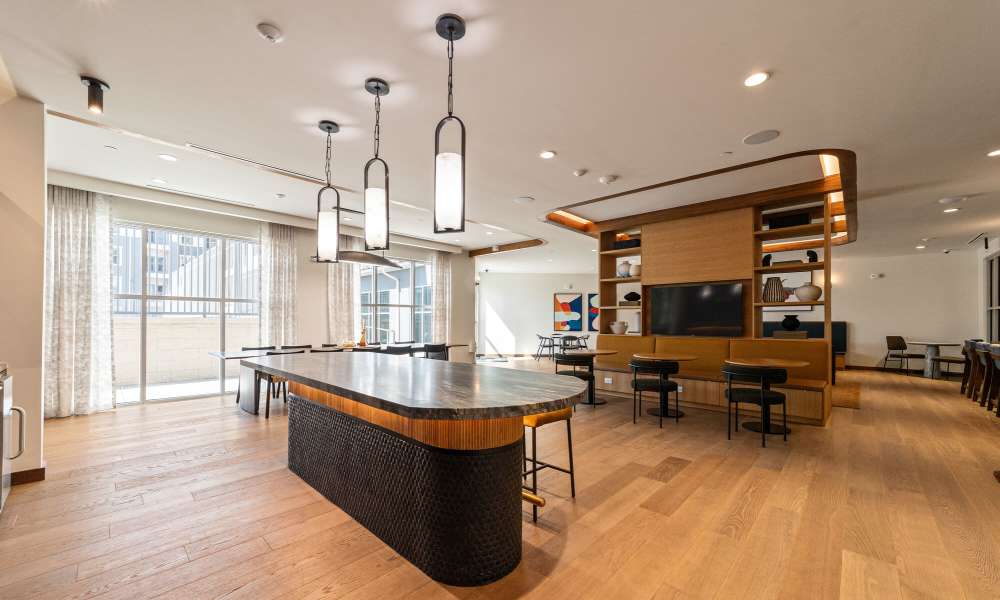 Clubhouse with a kitchen island at Main and Mill in Lewisville,Texas