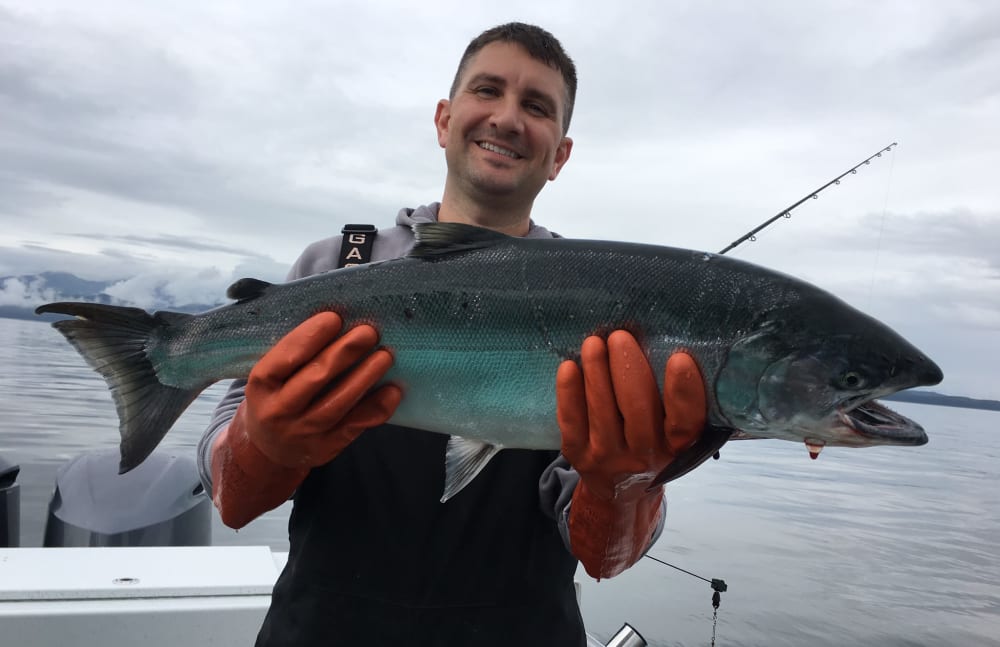 Tim from Touchmark at Fairway Village in Vancouver, Washington with a king salmon