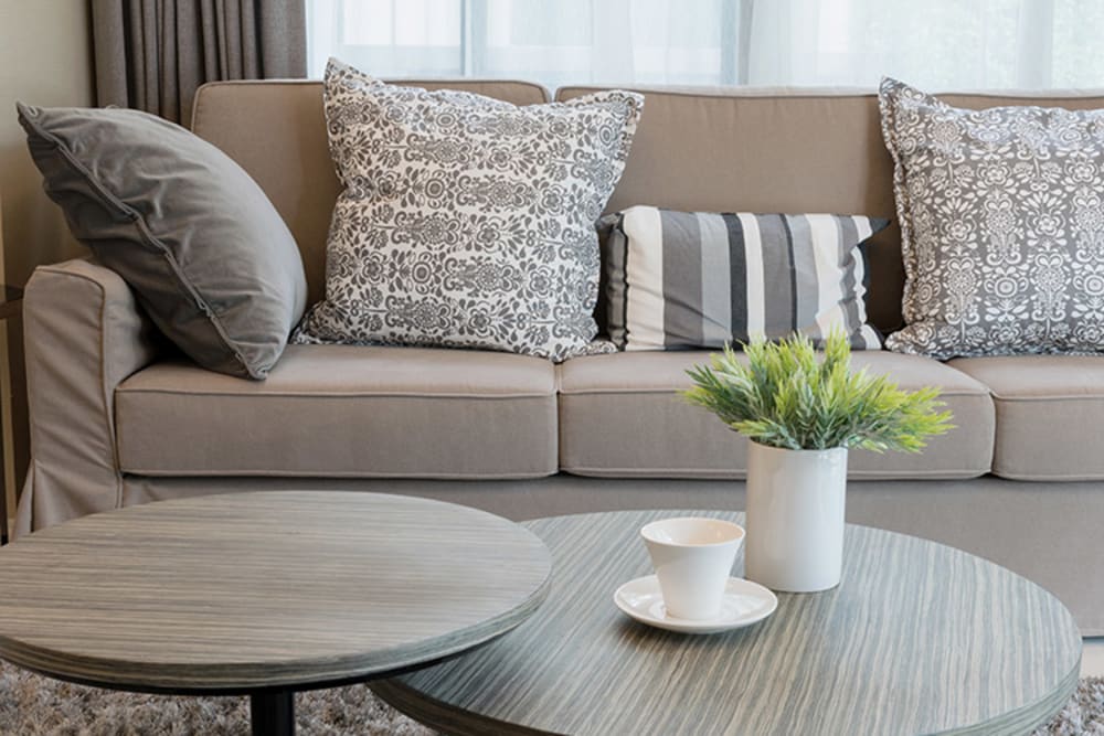 Well-decorated living room looks cozy and inviting at Pacific Shores Apartments