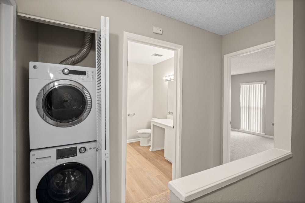 Laundry area adjacent to bathroom at Montecito Apartments in Santa Clara, California