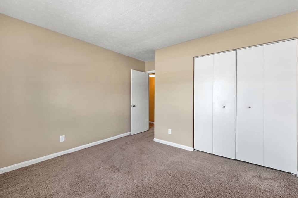 Bedroom with large closet at Addison Park Apartments, Louisville, Kentucky