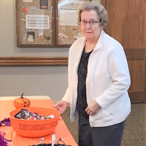 Resident at an event getting some food at Glen Carr House Memory Care in Derby, Kansas