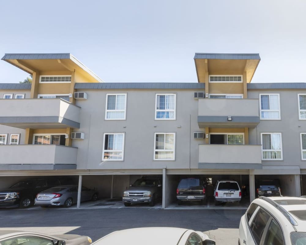 Carport and parking area at Palace Apartments in Concord, California