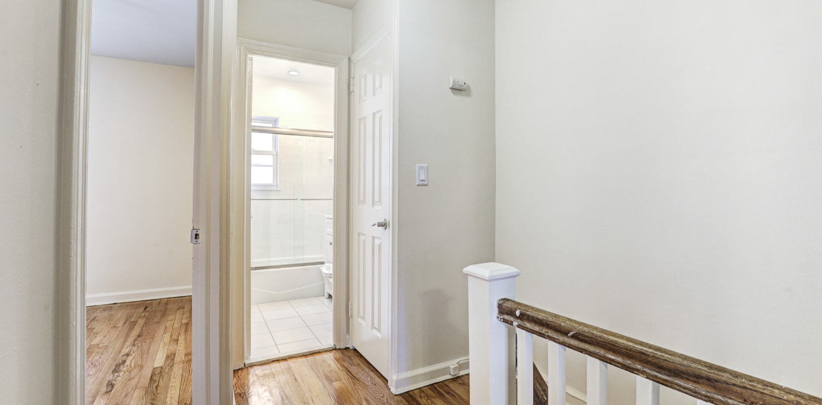 Clean, streamlined upstairs hallway at General Wayne Townhomes and Ridgedale Gardens in Madison, New Jersey