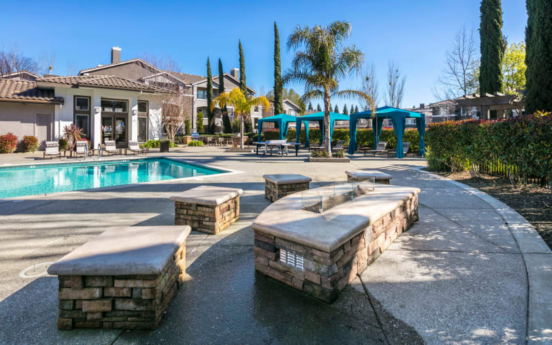 Fire pit and seating area near the pool at Miramonte and Trovas in Sacramento, California