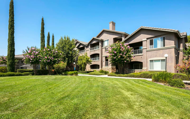 Beautiful landscaping and the building exterior at Miramonte and Trovas in Sacramento, California