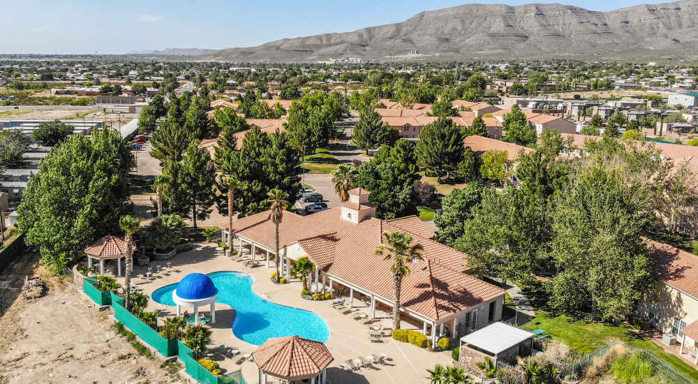 Aerial view of community with mountains in background near Las Ventanas in Alamogordo, New Mexico