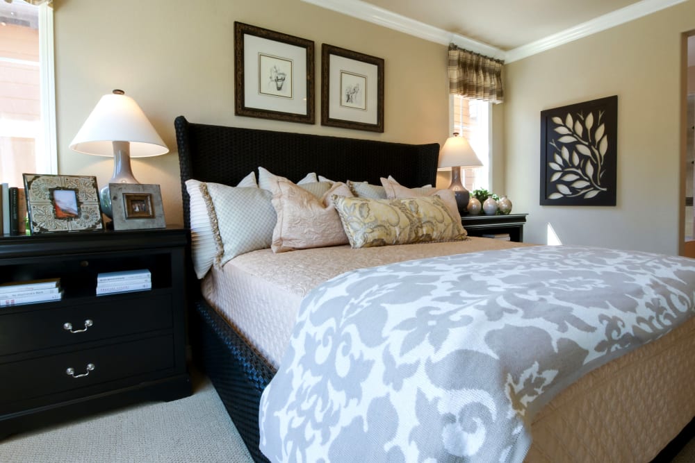 A large decorated bedroom at Brightwater Senior Living of Linden Ridge in Winnipeg, Manitoba