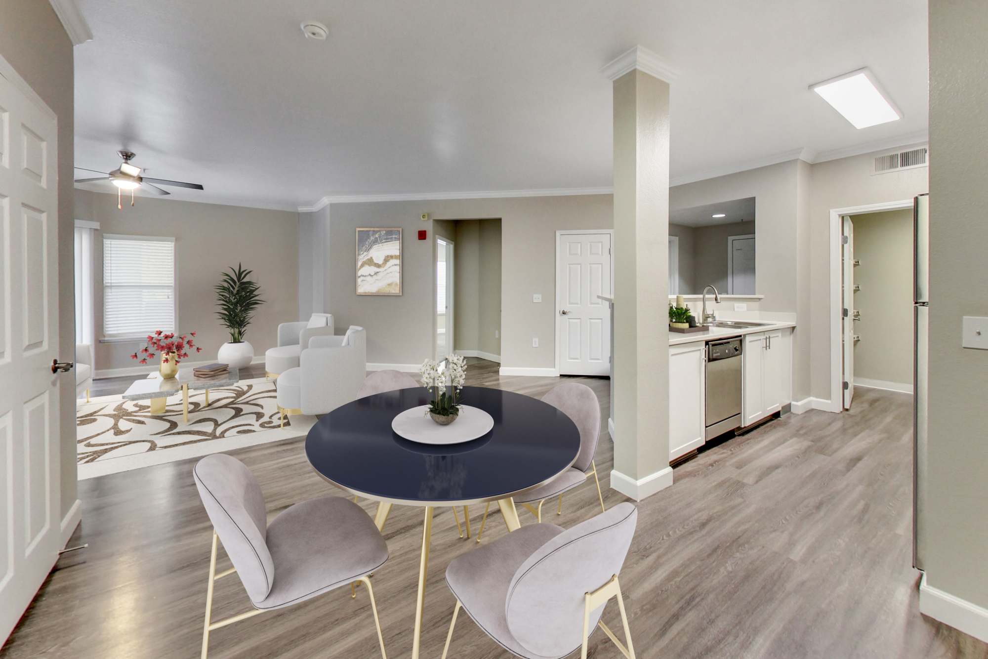 Living area with wood-style flooring at Avion Apartments in Rancho Cordova, California