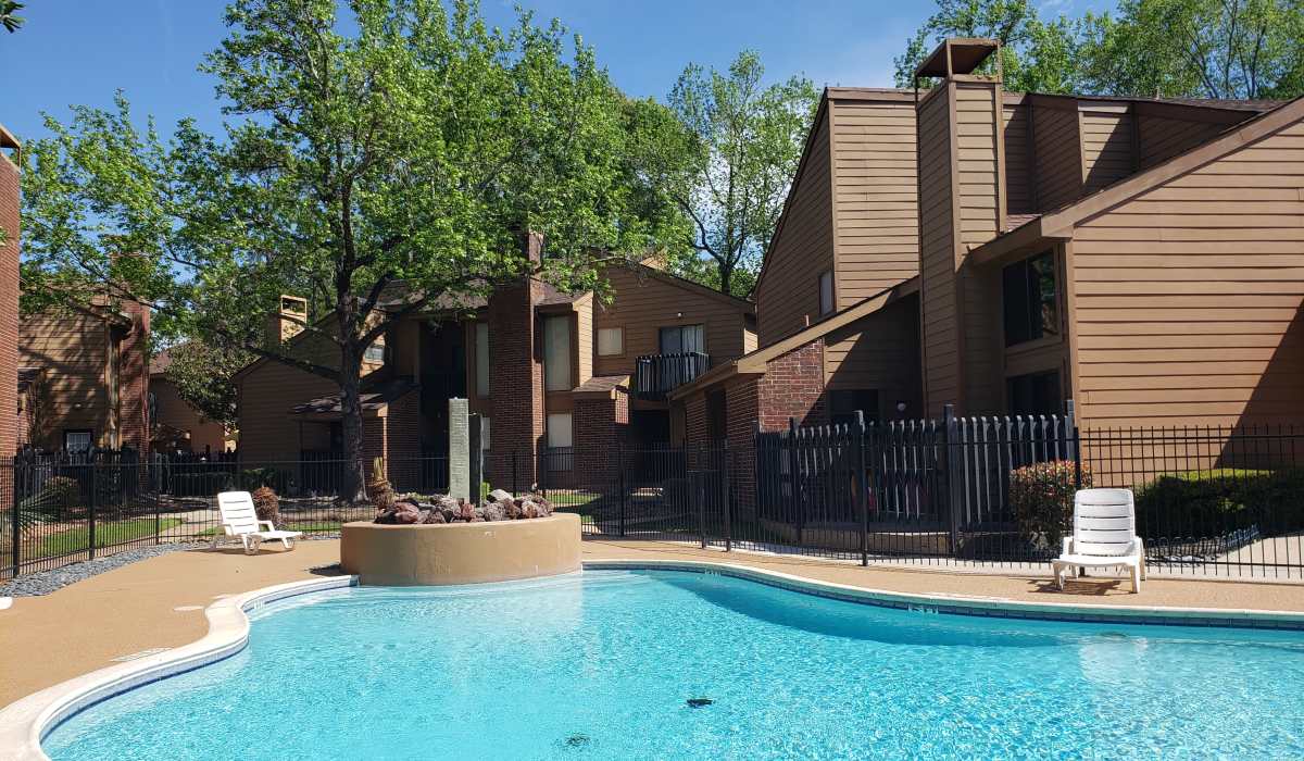 Community swimming pool at Oaks of Kingwood Apartments in Kingwood, Texas