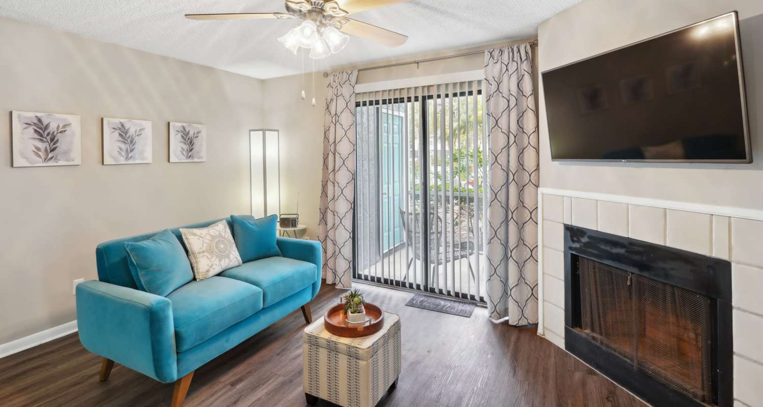 Cozy living room with fireplace at Lake Forest in Daytona Beach, Florida 