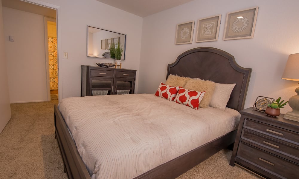 Cozy master bedroom at Windsail Apartments in Tulsa, Oklahoma