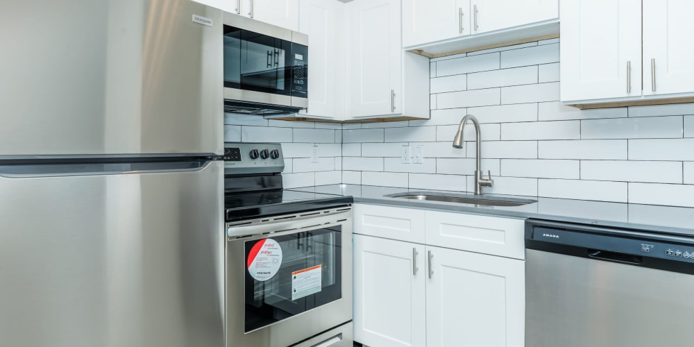 Kitchen with stainless-steel appliances at Tides on Palm in Las Vegas, Nevada