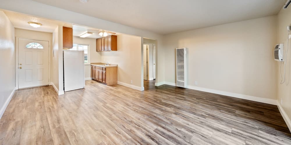 Spacious apartment with wood-style flooring at Mountain View Apartments in Concord, California