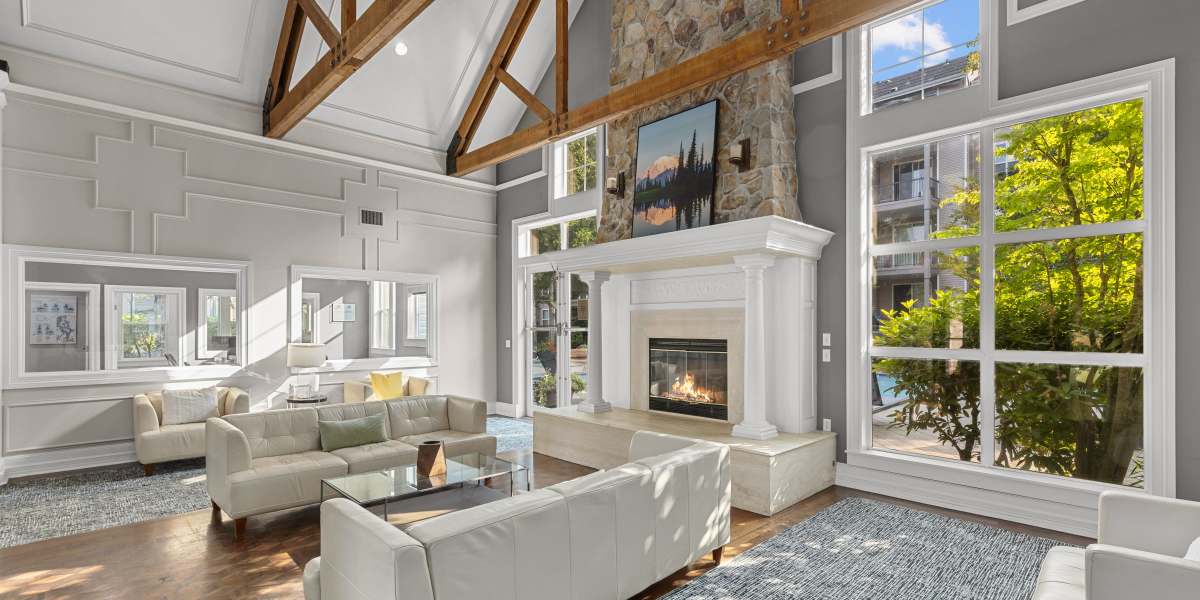 Upscale resident lounge with fireplace at HighGrove Apartments in Everett, Washington
