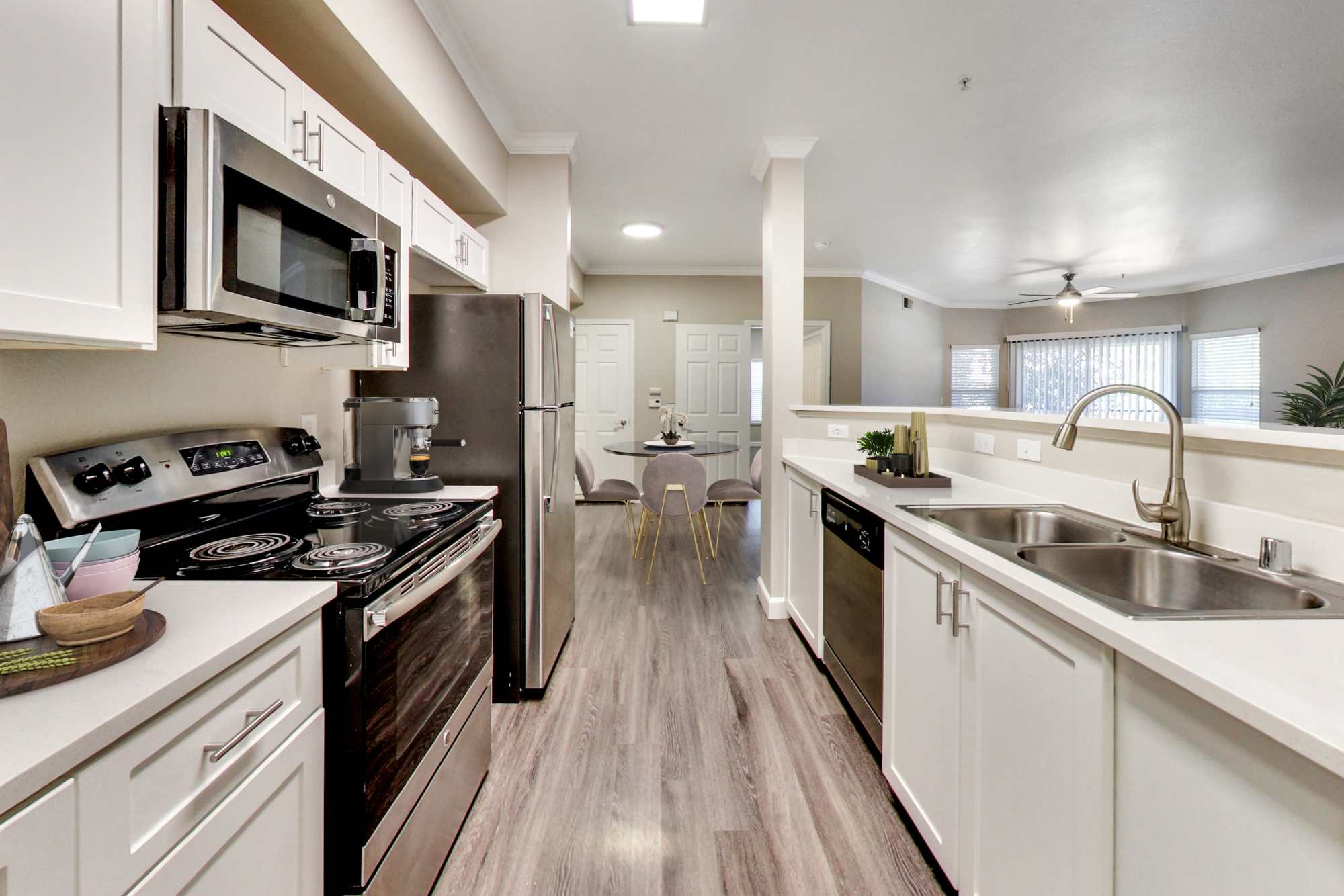 Kitchen with stainless-steel appliances at Avion Apartments in Rancho Cordova, California