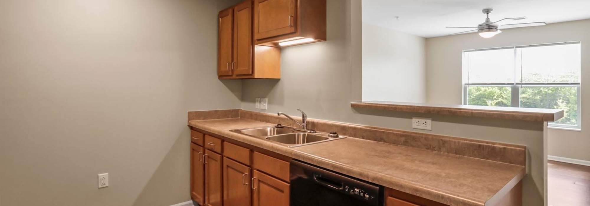 Kitchen with view to living room window at Allegany Junction in Cumberland, Maryland
