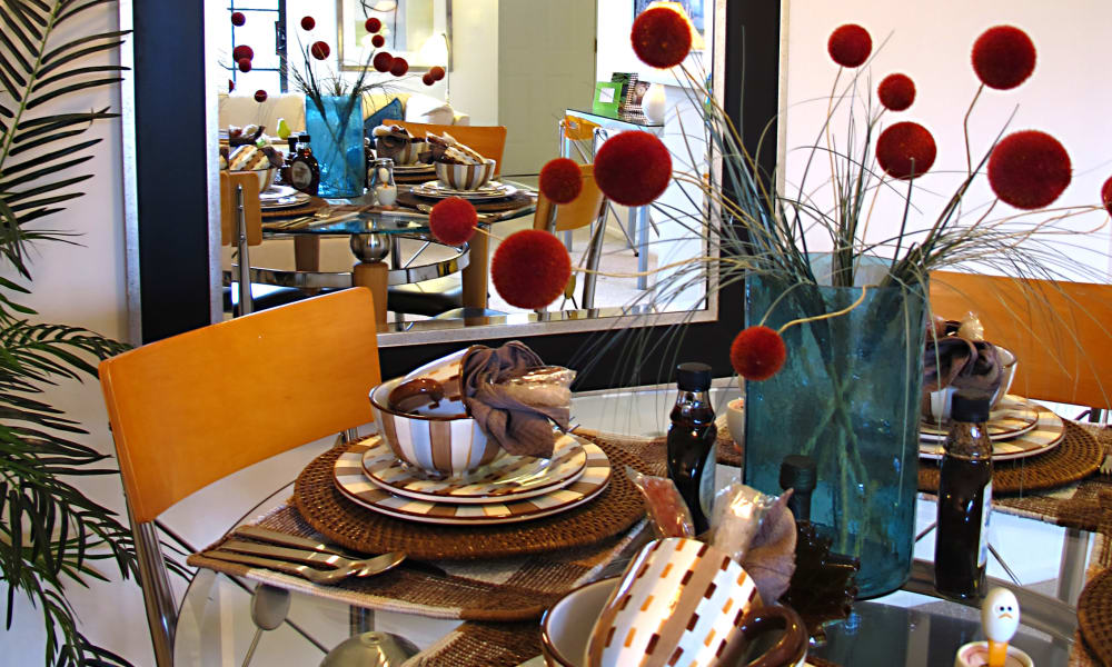 Beautiful dining table at Saddle Creek Apartments in Novi, Michigan