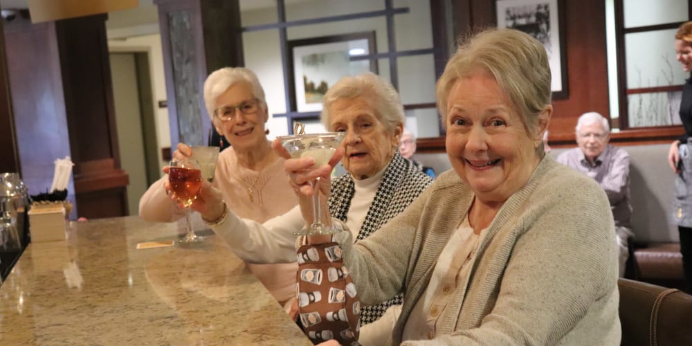 Residents enjoying beverages at The Springs at Carman Oaks in Lake Oswego, Oregon.
