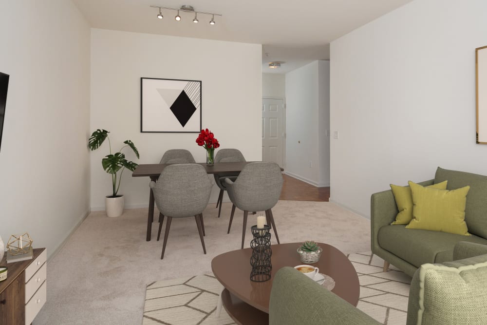 Living room and dining area in an open concept model apartment home at The Brunswick in New Brunswick, New Jersey