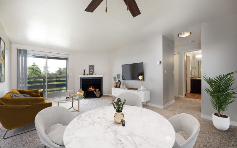 A bright and open living room and dining room at Latitude Apartments in Everett, Washington