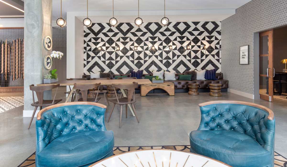 Table and chairs in the lounge area at The Moran in Oakland, California