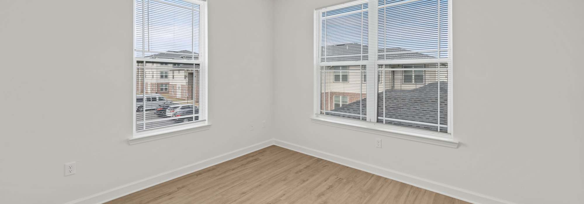 Bedroom with large windows at Fletcher Black in Panama City, Florida