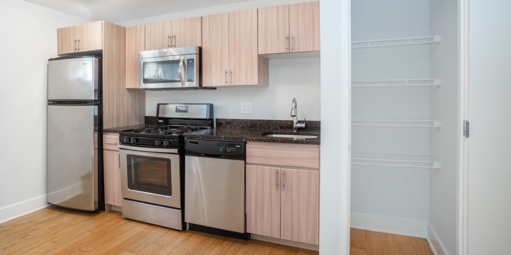Model kitchen with modern appliances at The Conwell in Washington, District of Columbia