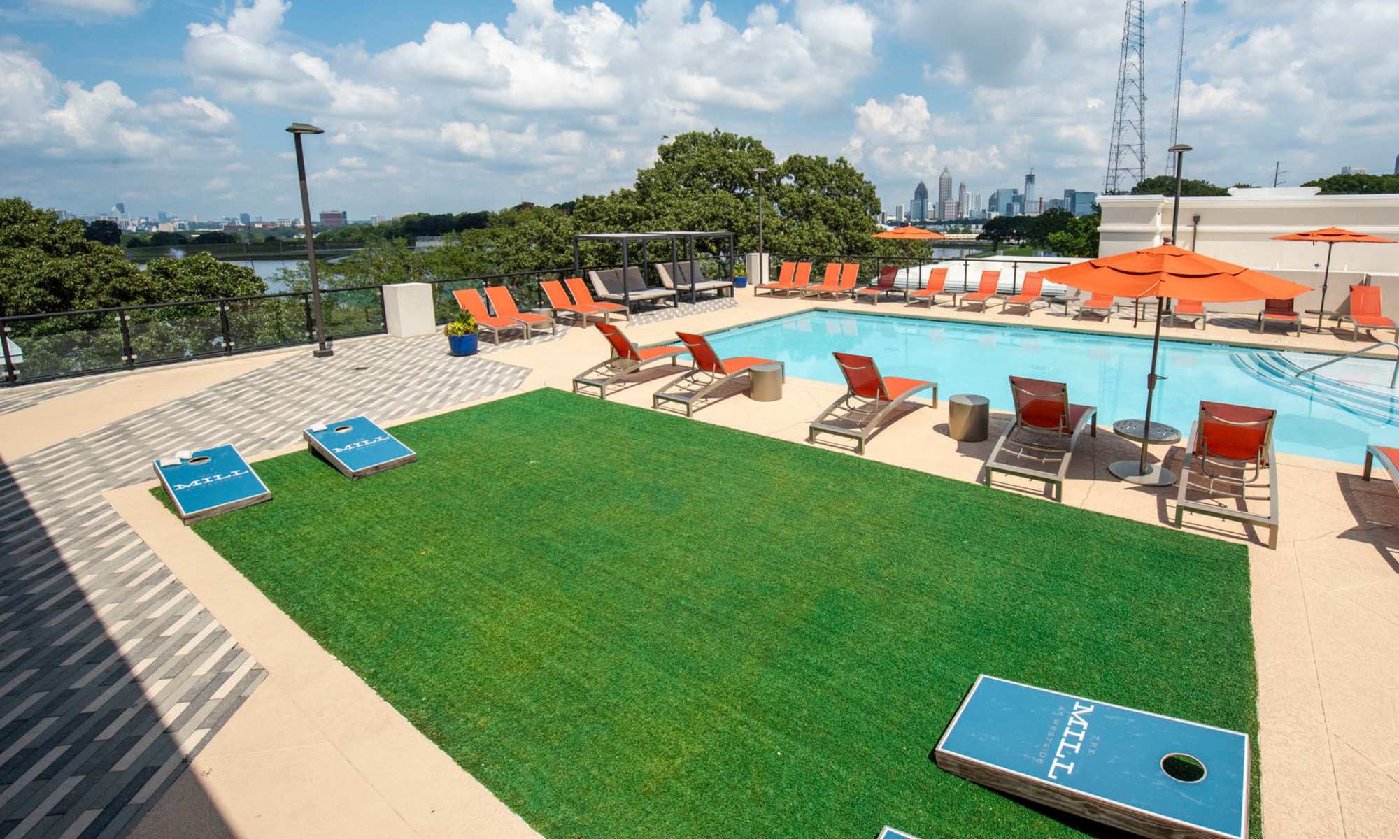 Activity area with pool view at The Mill at Westside in Atlanta, Georgia