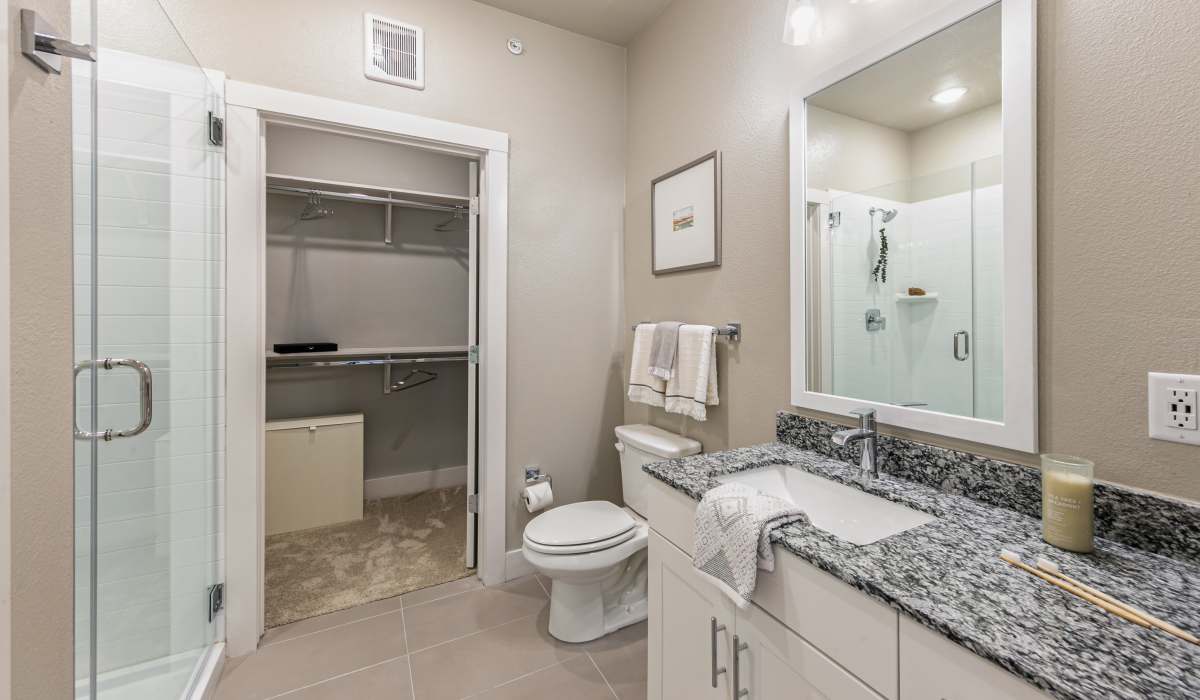 Bathroom with attached closet at The View at Belterra in Austin, Texas