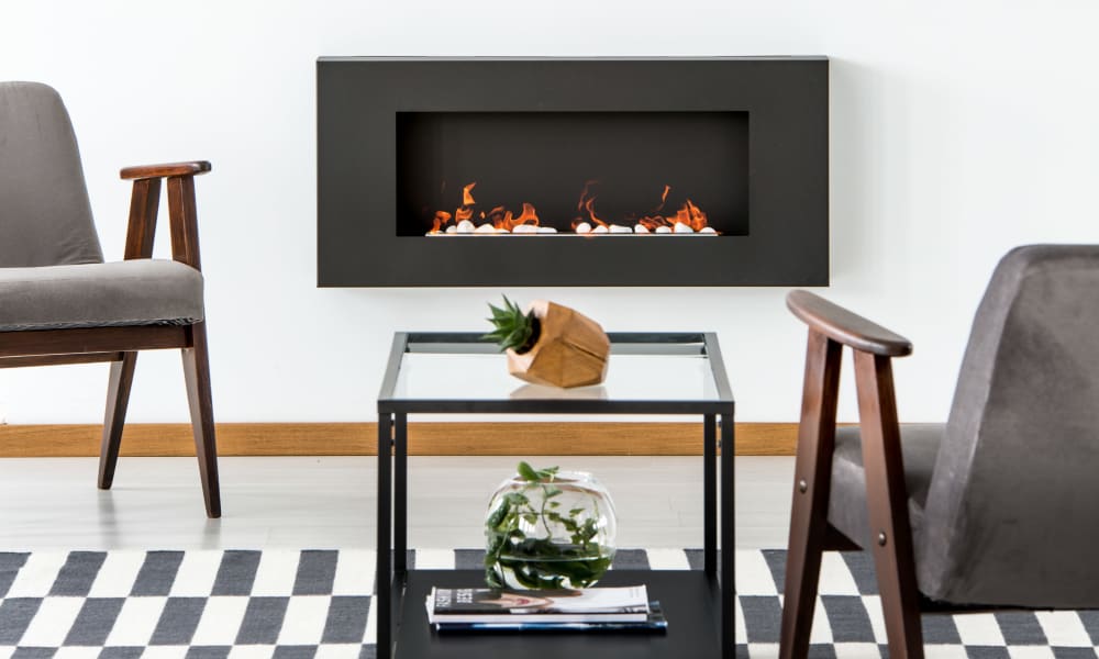 Fireplace in living room in a model home at Dixon at Stonegate in Fort Worth, Texas