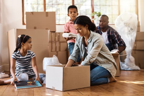 A family in Baton Rouge, Louisiana, packing their belongings for storage
