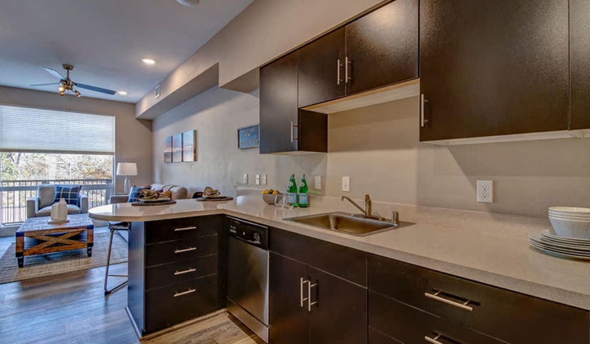 Kitchen with prep island at Riverside Park Apartments in Reno, Nevada