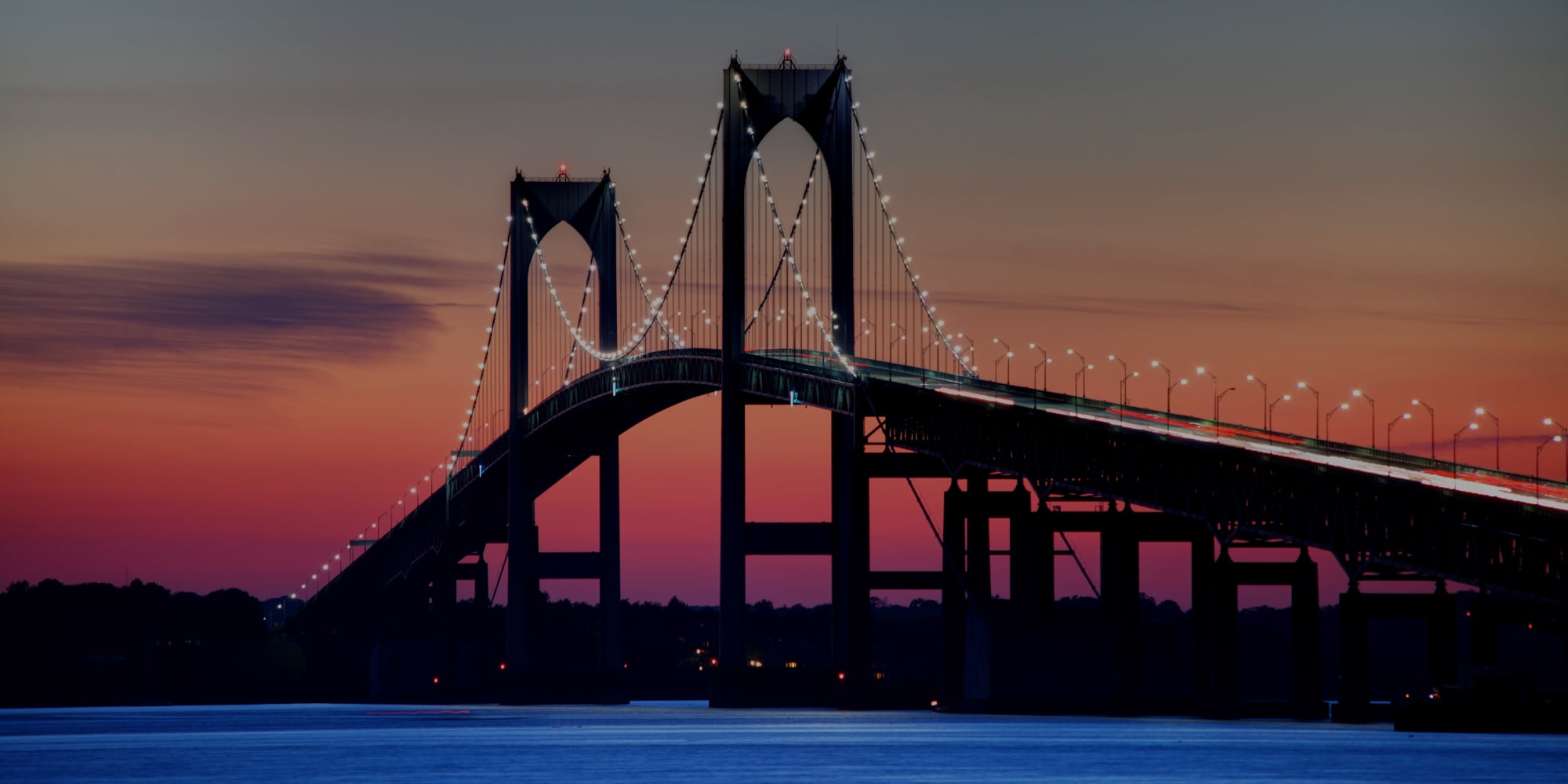 Sun setting over a bridge in Boston, MA