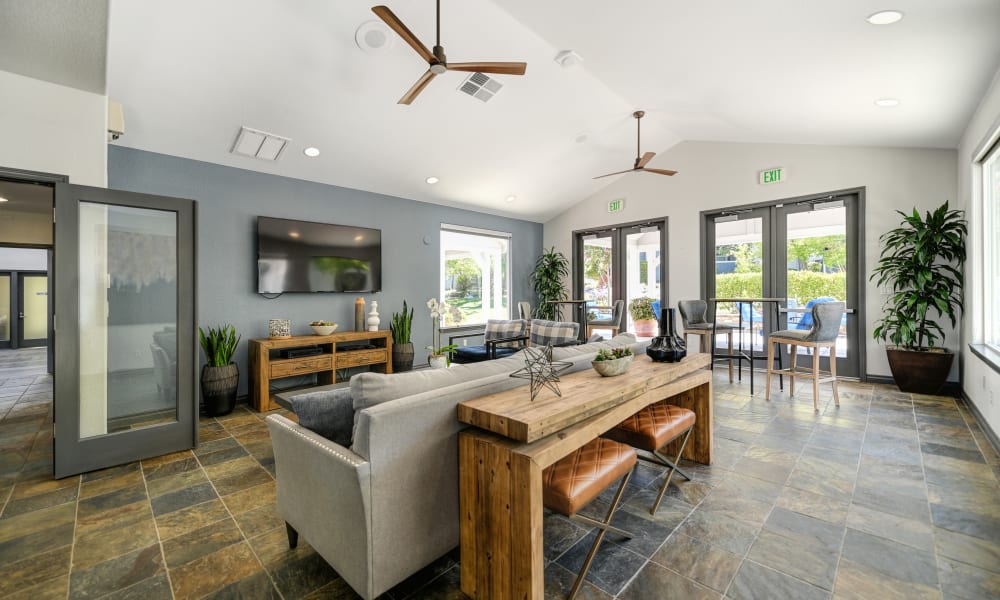 Couches and a tv at Rocklin Ranch Apartments in Rocklin, California